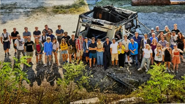 On set with cast and crew